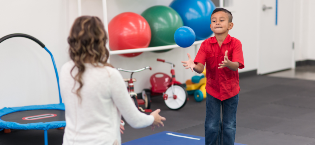 Kids exercising in physical therapy clinic